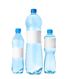 Image of Bottles of pure water with blank labels on white background