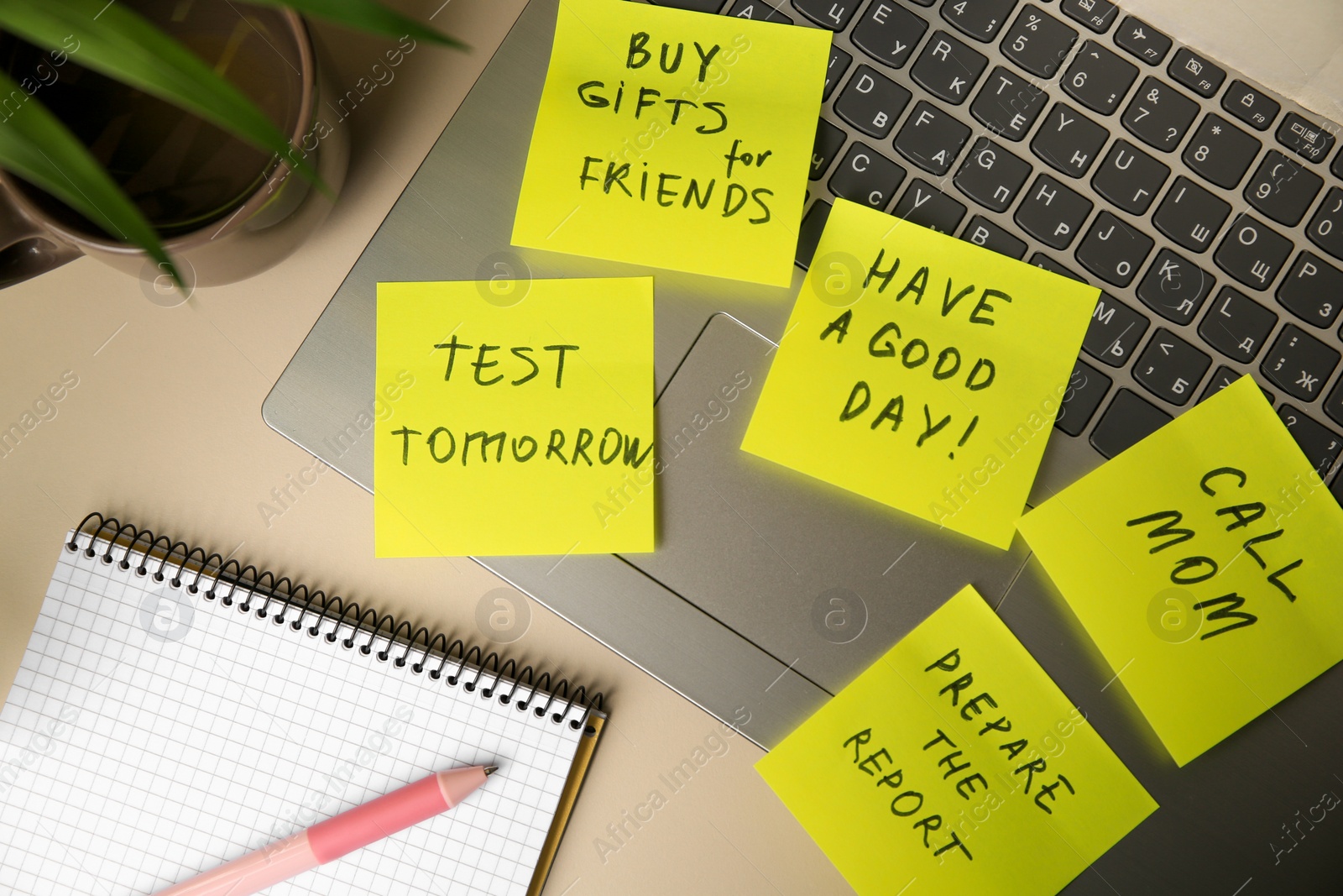 Photo of Many different reminder notes and laptop on white table, flat lay