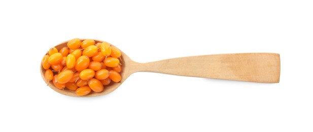 Fresh ripe sea buckthorn berries in wooden spoon on white background, top view