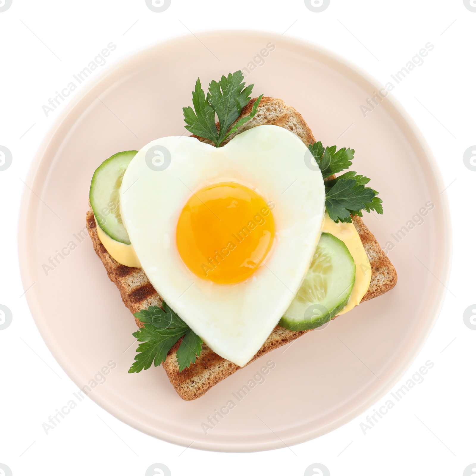 Photo of Plate of tasty sandwich with heart shaped fried egg isolated on white, top view