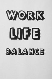 Photo of Work, Life, Balance written on white background, top view