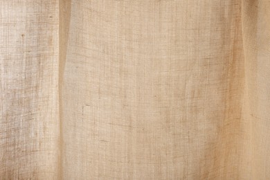 Texture of natural burlap fabric as background, closeup