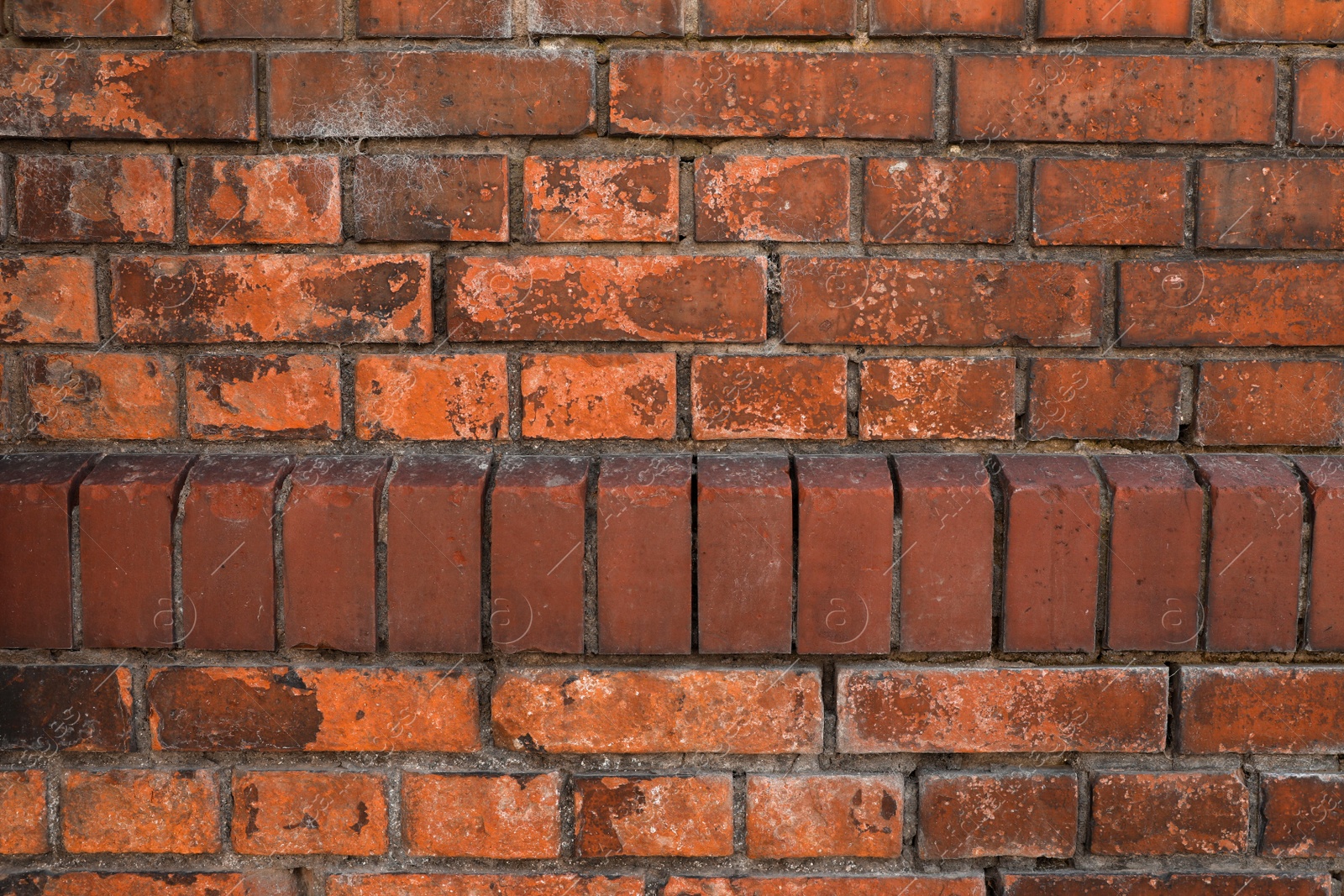 Photo of Texture of old red brick wall as background