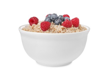 Photo of Tasty boiled oatmeal with berries in bowl isolated on white