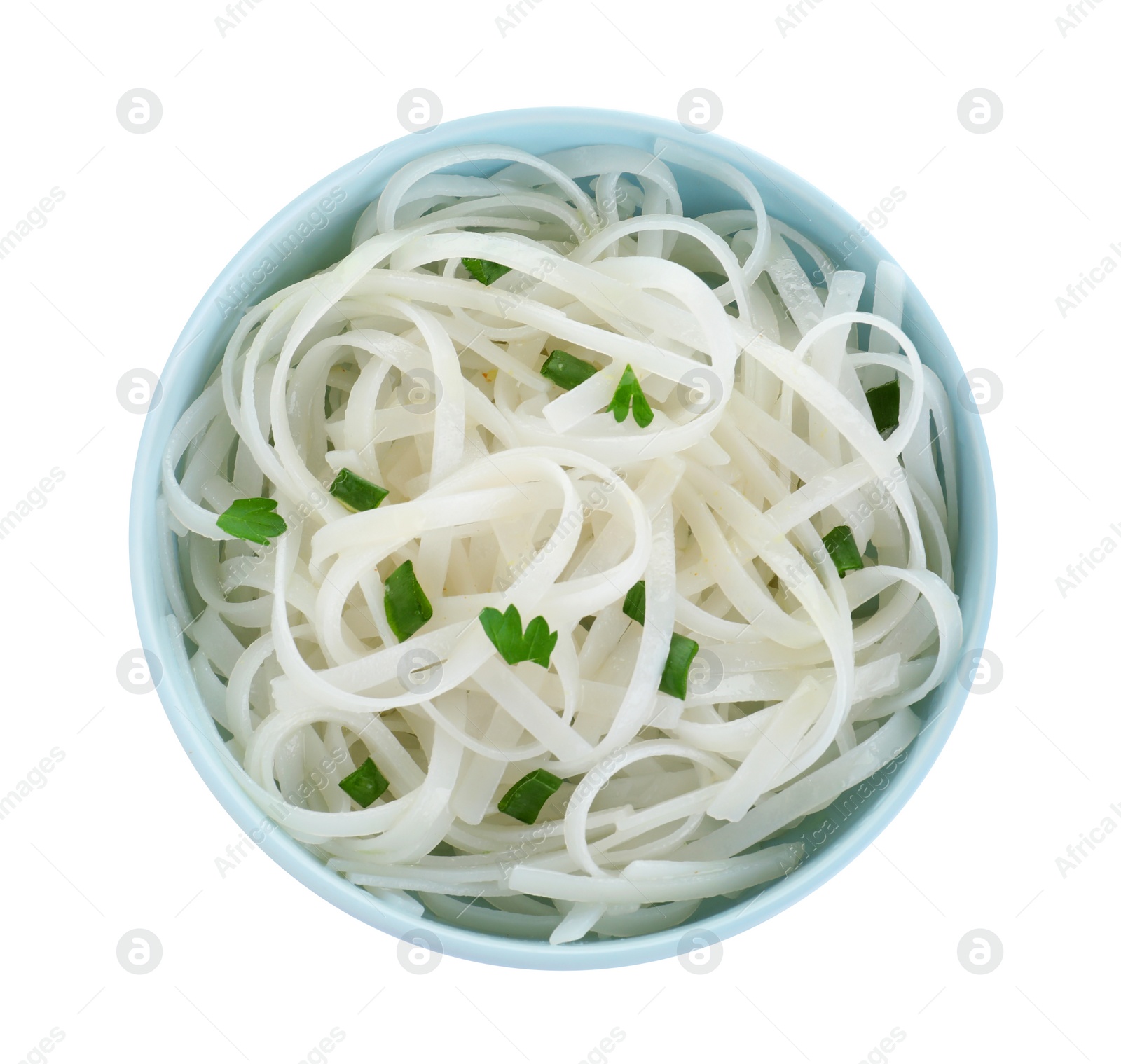 Photo of Bowl of tasty cooked rice noodles and herbs isolated on white, top view