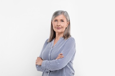 Portrait of beautiful senior woman on white background