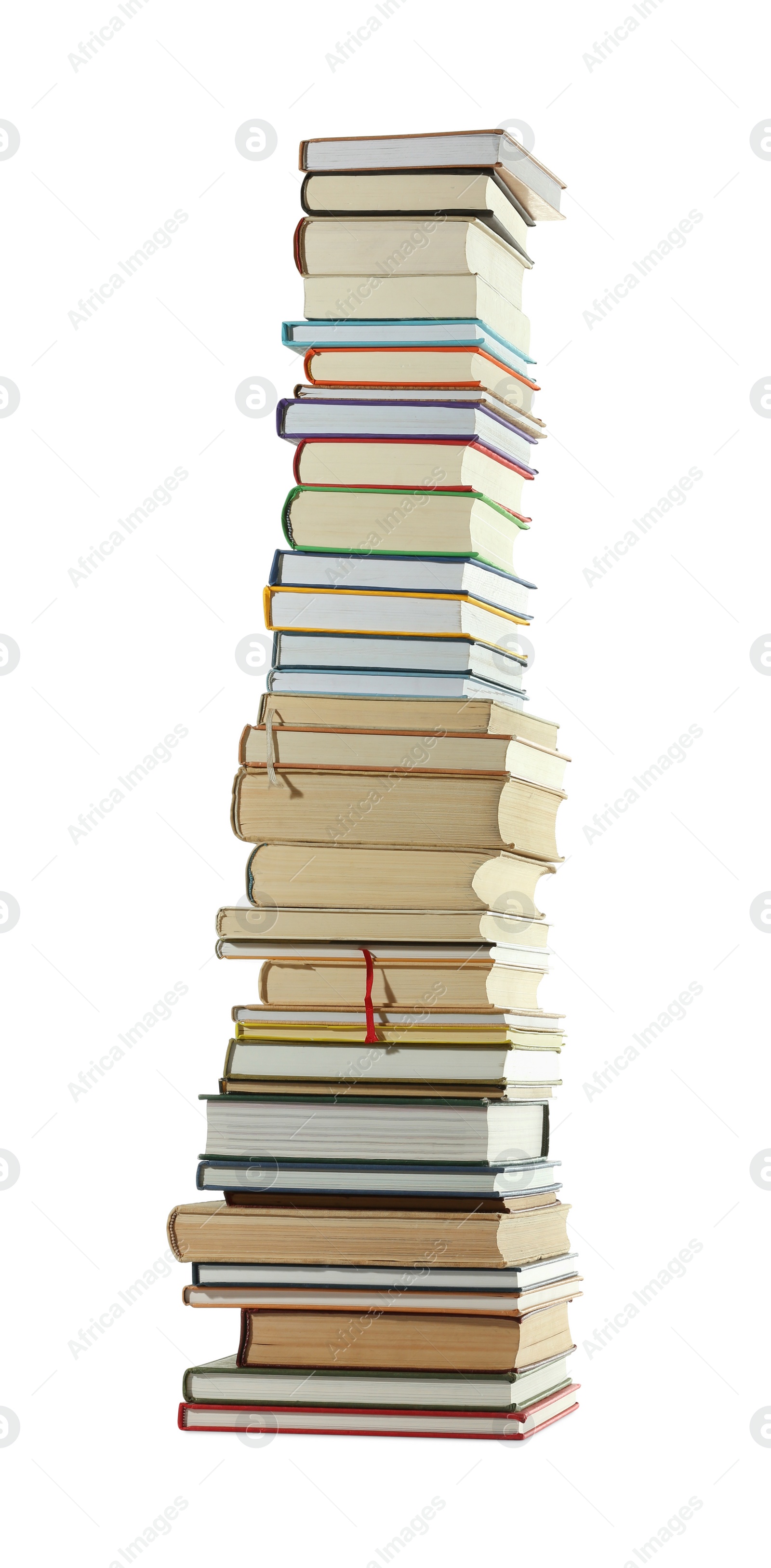 Photo of High stack of many different books isolated on white