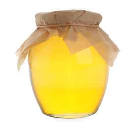 Glass jar of acacia honey isolated on white