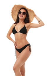 Pretty sexy woman with slim body in stylish black bikini on white background