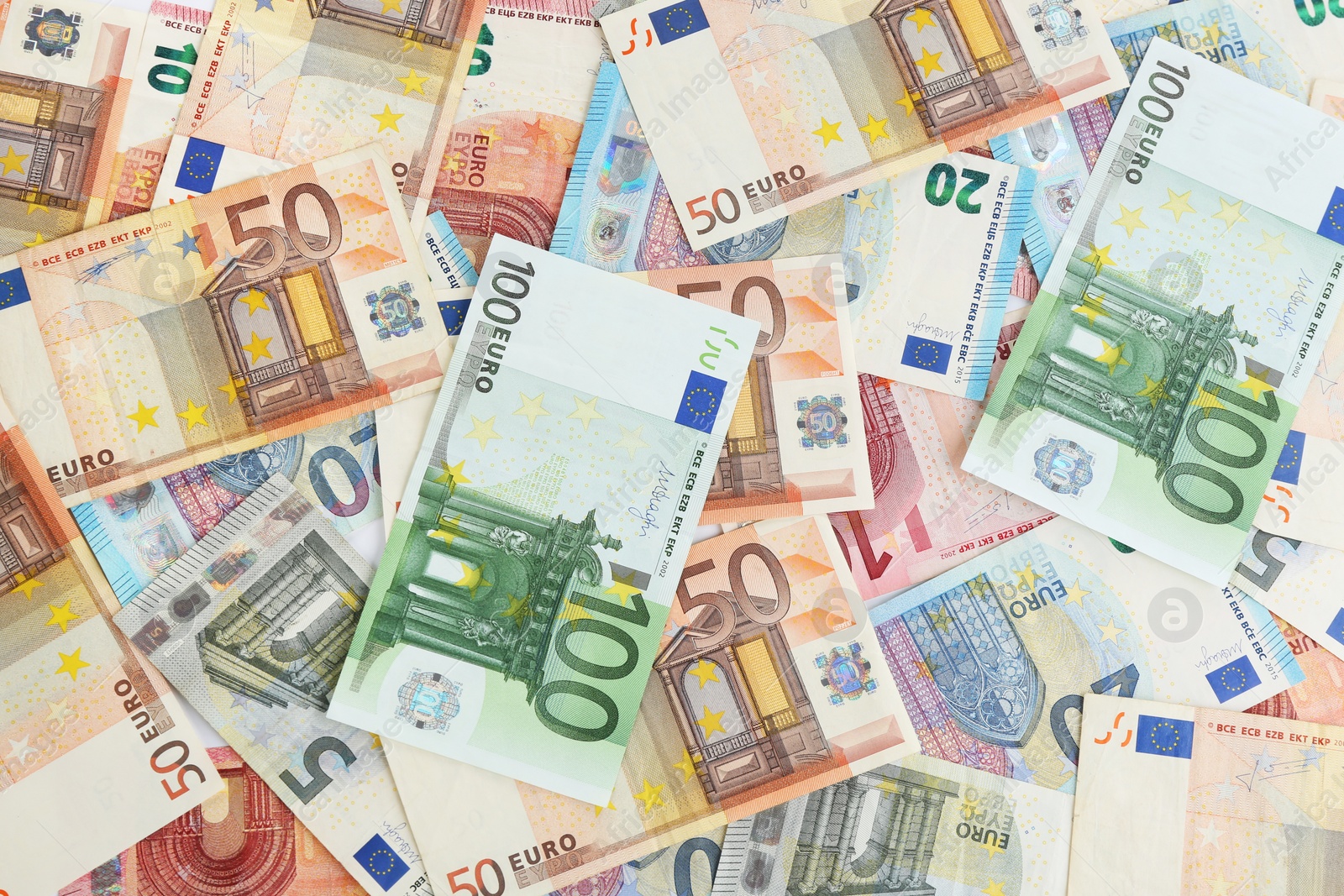 Photo of Euro banknotes as background, top view. Money and finance