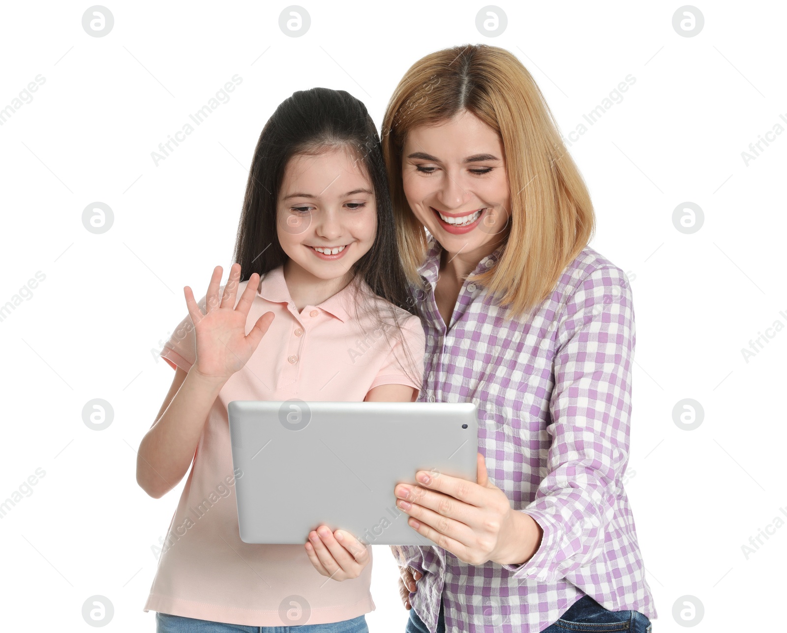 Photo of Mother and her daughter using video chat on tablet against white background