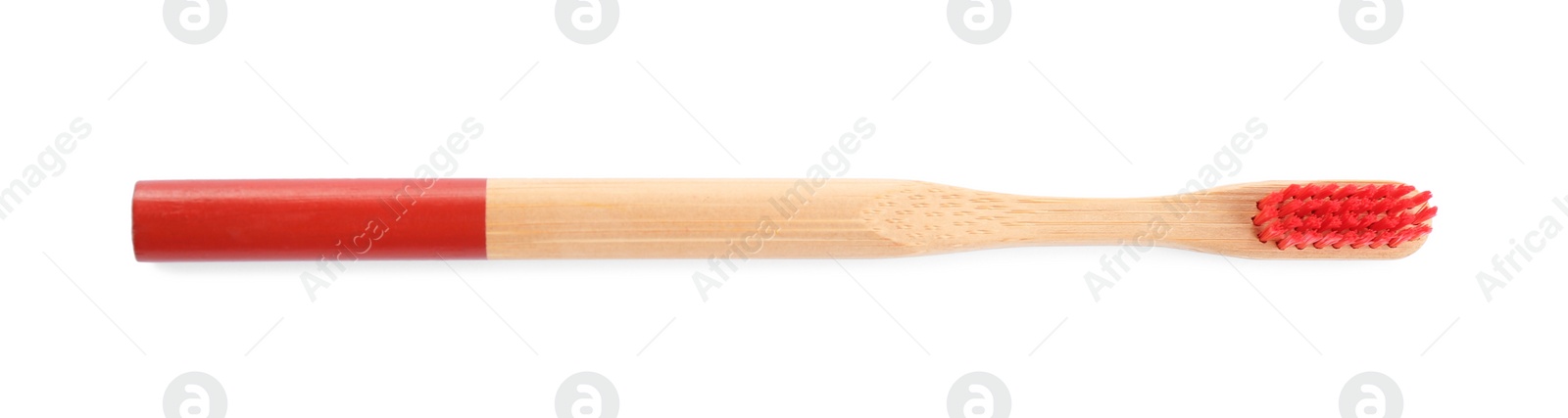 Photo of Bamboo toothbrush with red bristle isolated on white, top view