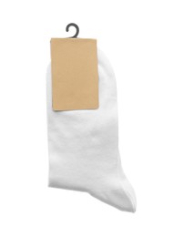 Photo of New pair of cotton socks on white background, top view