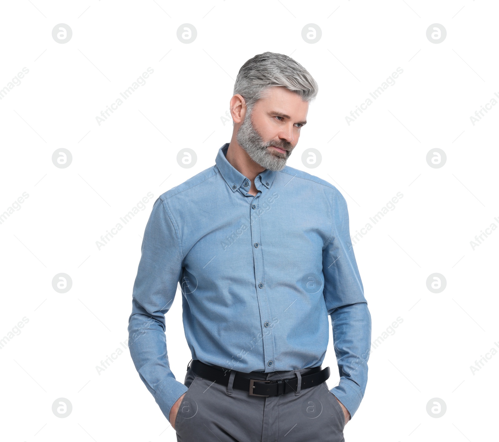 Photo of Mature businessman in stylish clothes posing on white background