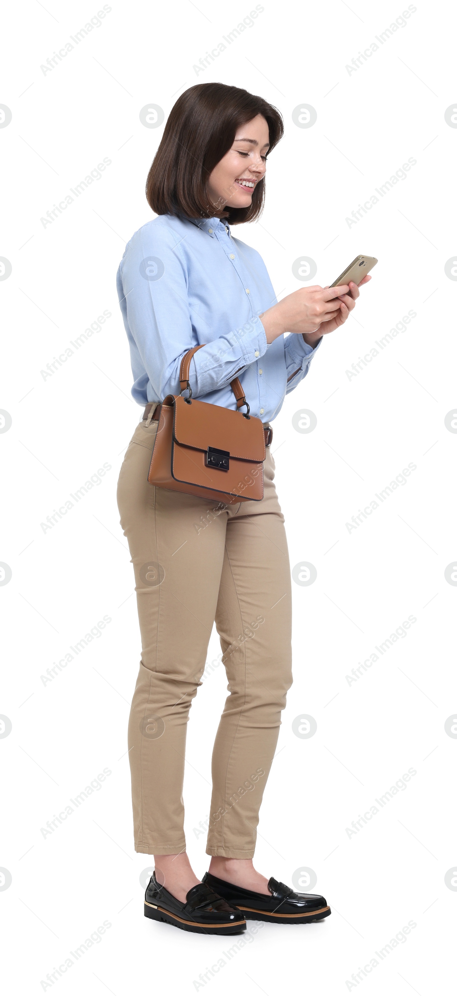 Photo of Happy businesswoman with bag woman using smartphone on white background