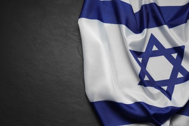 Photo of Flag of Israel on grey textured background, top view and space for text. National symbol