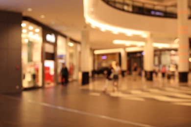 Photo of Blurred view of big modern shopping mall