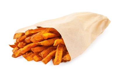 Photo of Paper bag with tasty sweet potato fries isolated on white