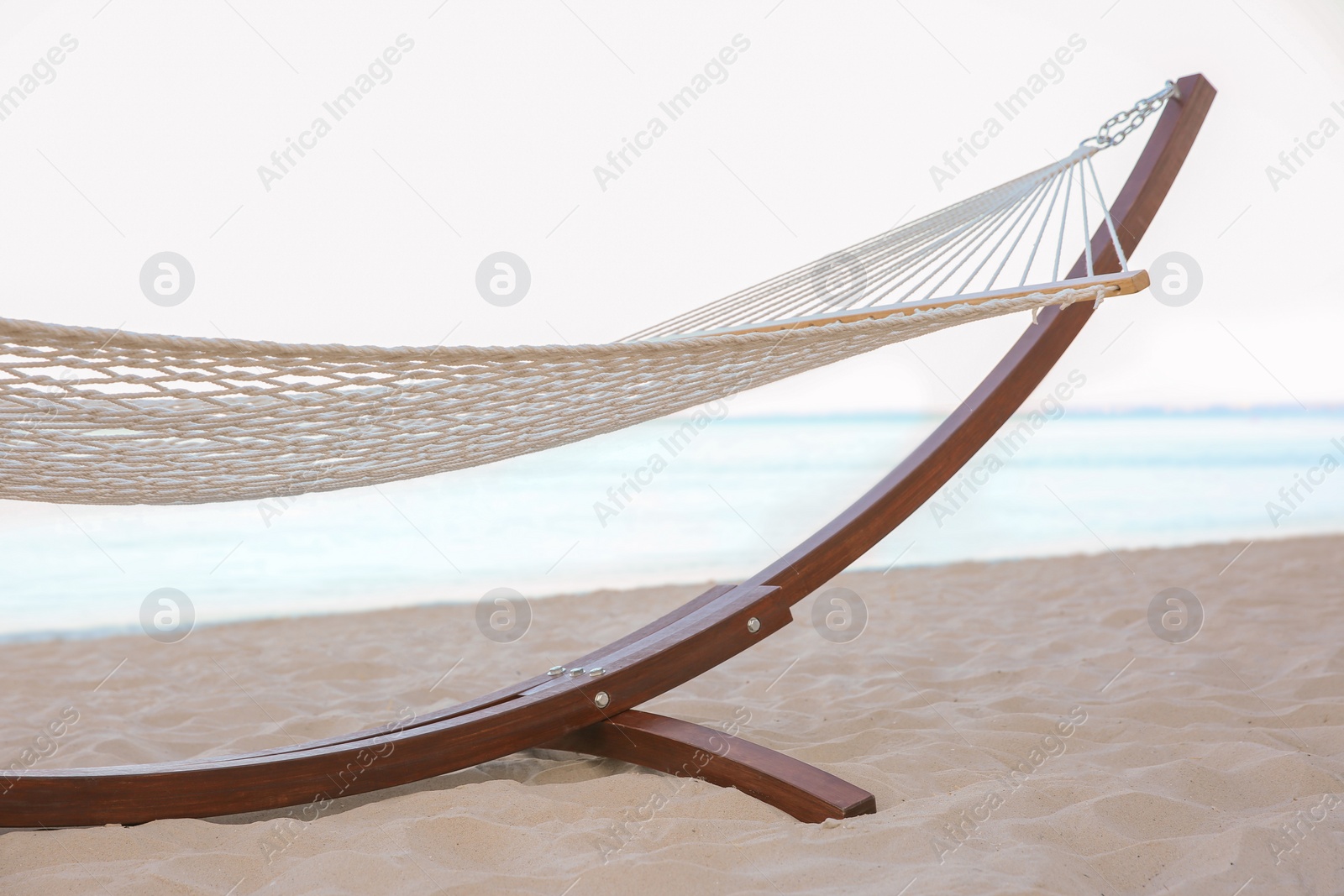 Photo of Empty hammock at seaside. Time to relax