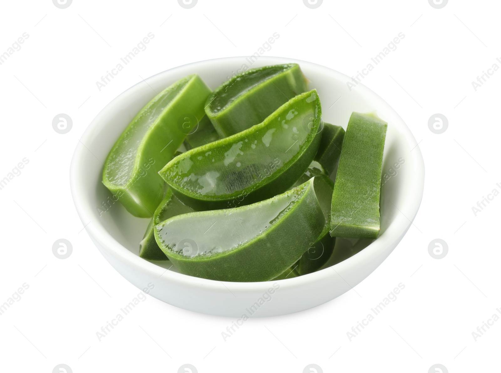 Photo of Bowl with fresh aloe vera slices isolated on white