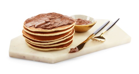 Photo of Delicious pancakes with chocolate paste, fork and knife isolated on white