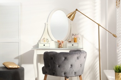 Photo of Stylish room interior with elegant dressing table