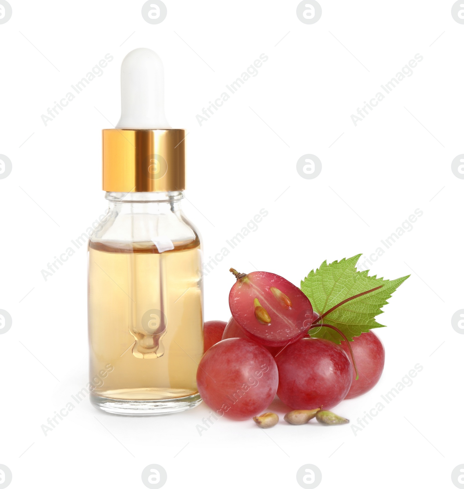 Photo of Organic red grapes, seeds and bottle of natural essential oil on white background