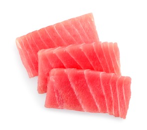 Tasty sashimi (pieces of fresh raw tuna) on white background, top view