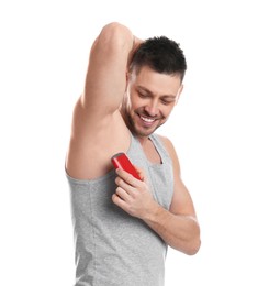 Photo of Handsome man applying deodorant isolated on white