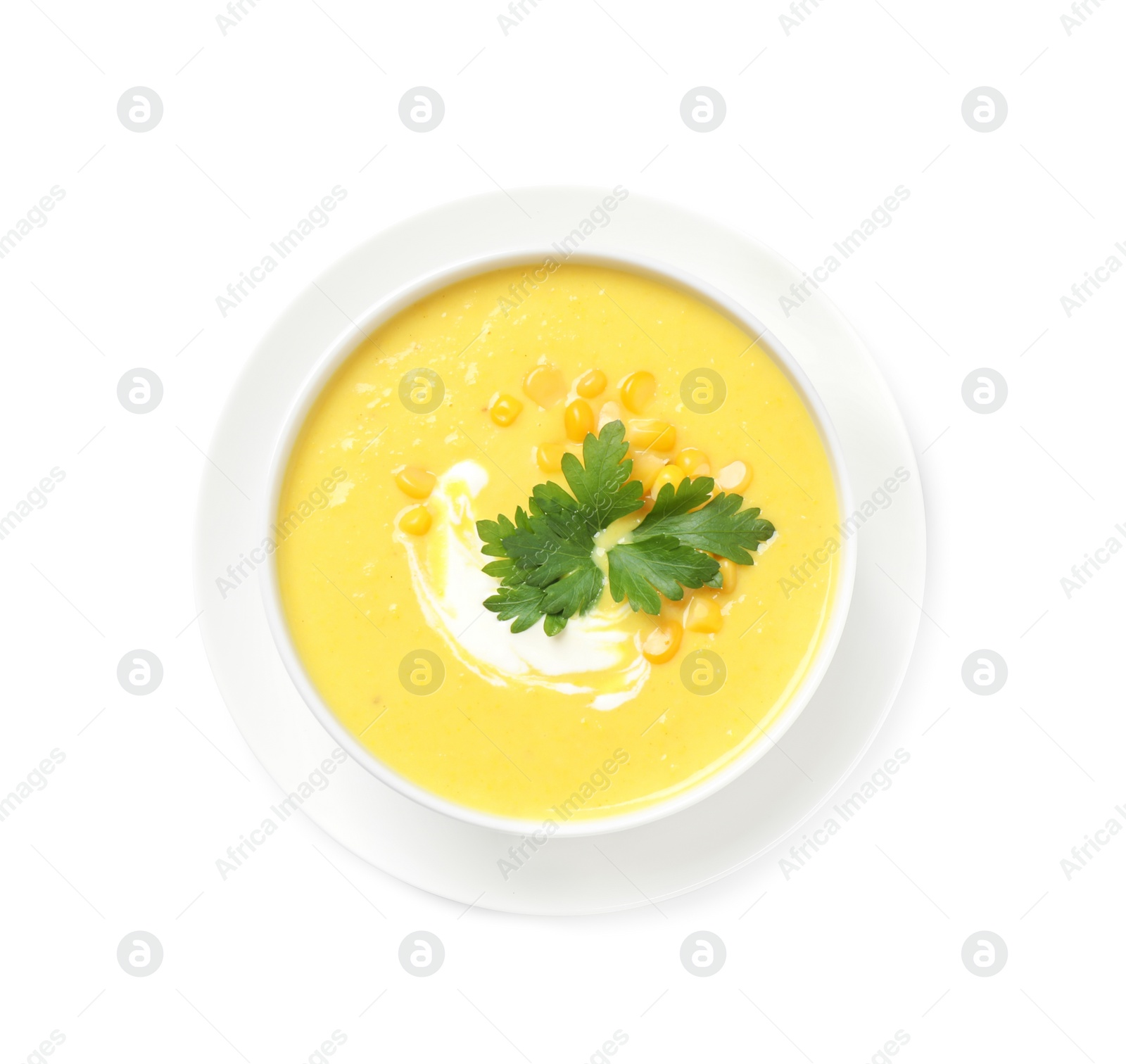 Photo of Delicious creamy corn soup isolated on white, top view