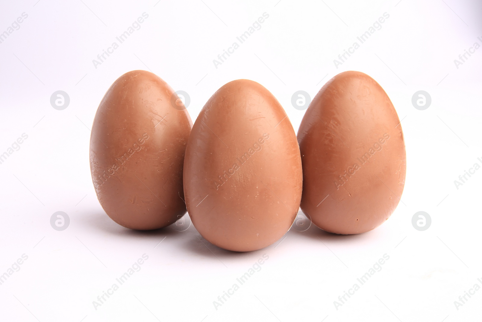 Photo of Sveti Vlas, Bulgaria - June 27, 2023: Unwrapped Kinder Surprise Eggs isolated on white