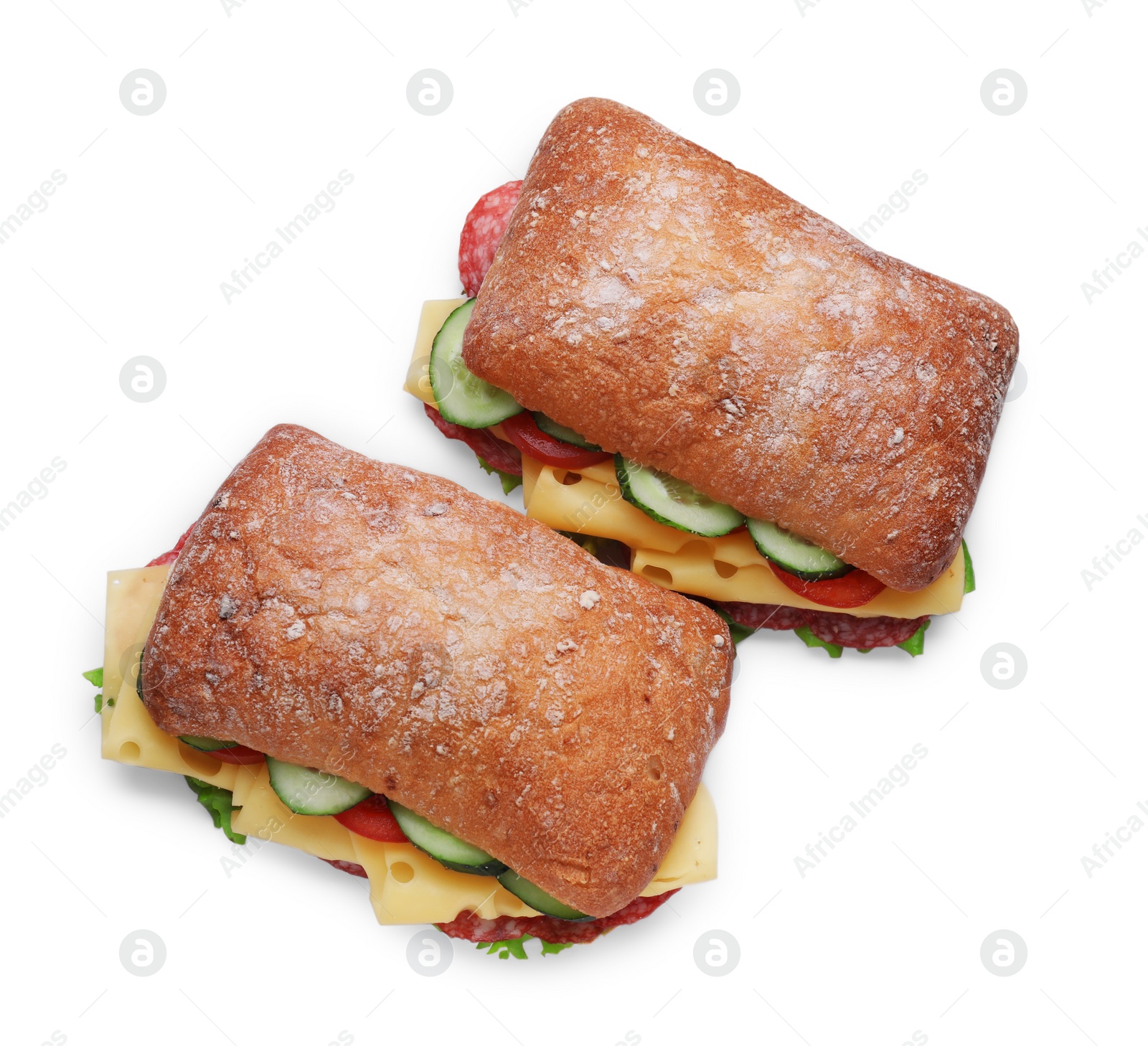 Photo of Delicious sandwiches with fresh vegetables, cheese and salami isolated on white, above view