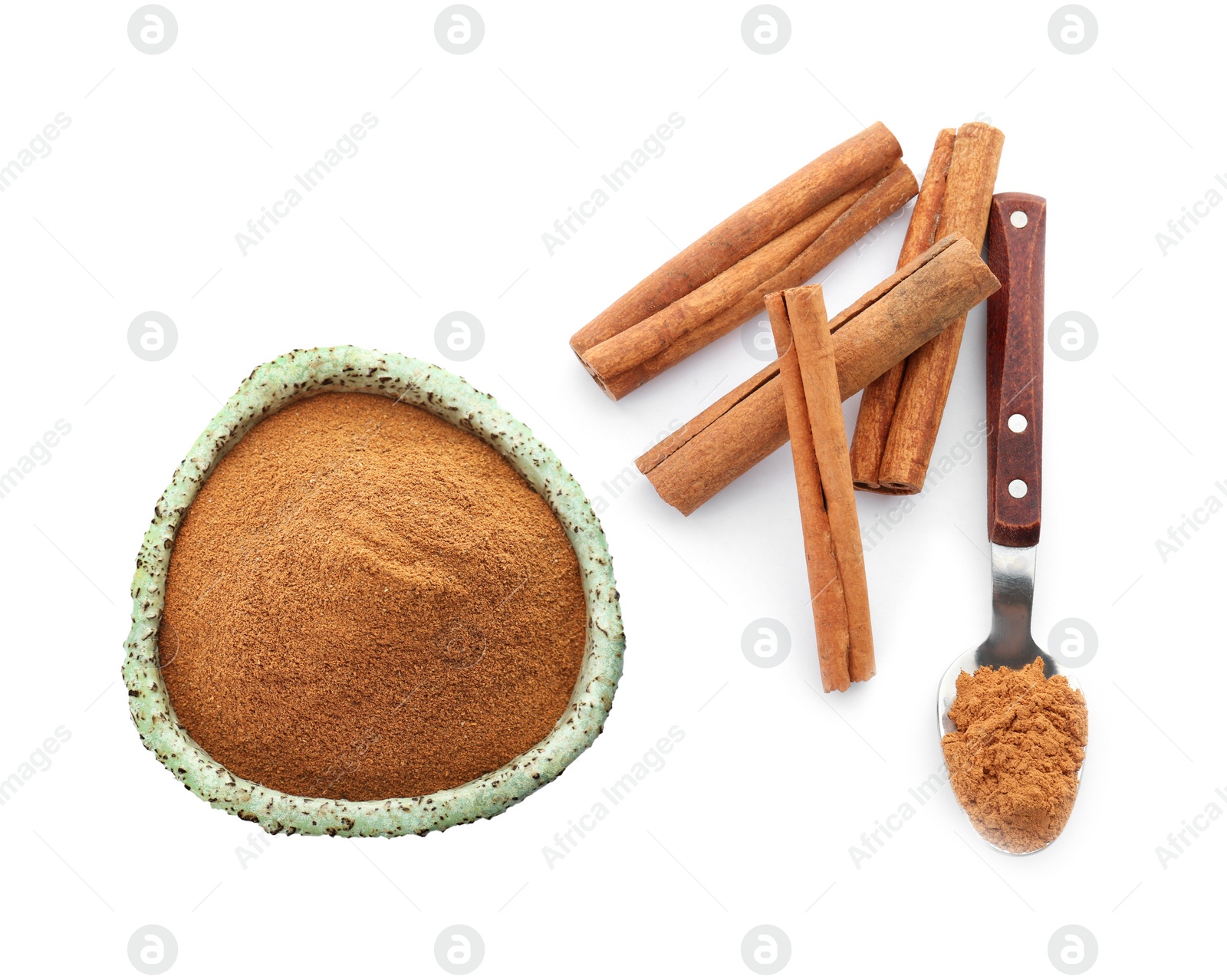 Image of Aromatic cinnamon sticks and powder on white background, top view