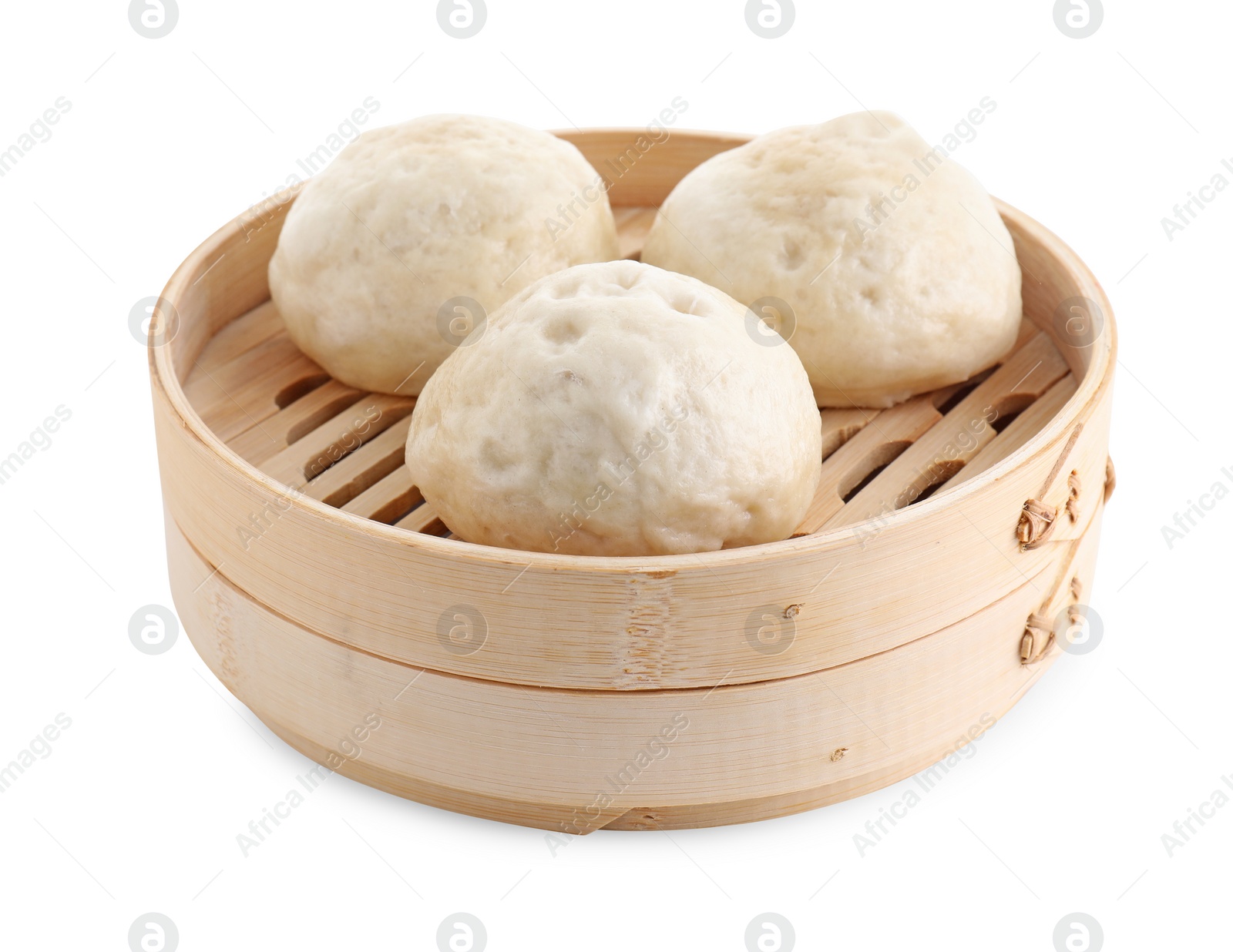 Photo of Delicious chinese steamed buns in bamboo steamer isolated on white