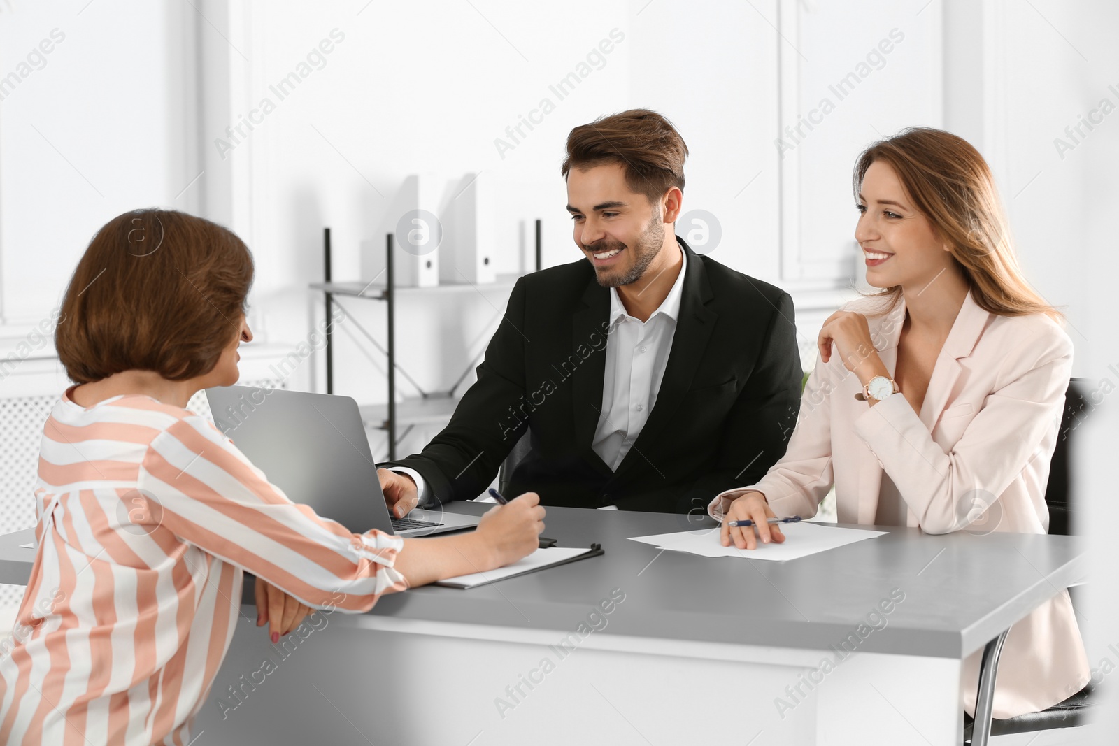 Photo of Human resources commission conducting job interview with applicant in office