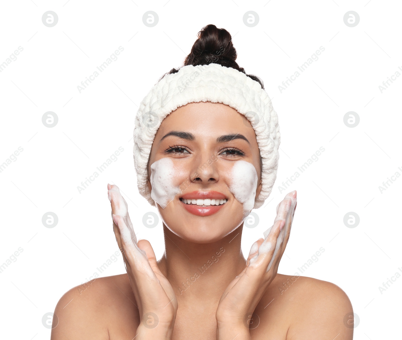 Photo of Beautiful woman applying facial cleansing foam on white background