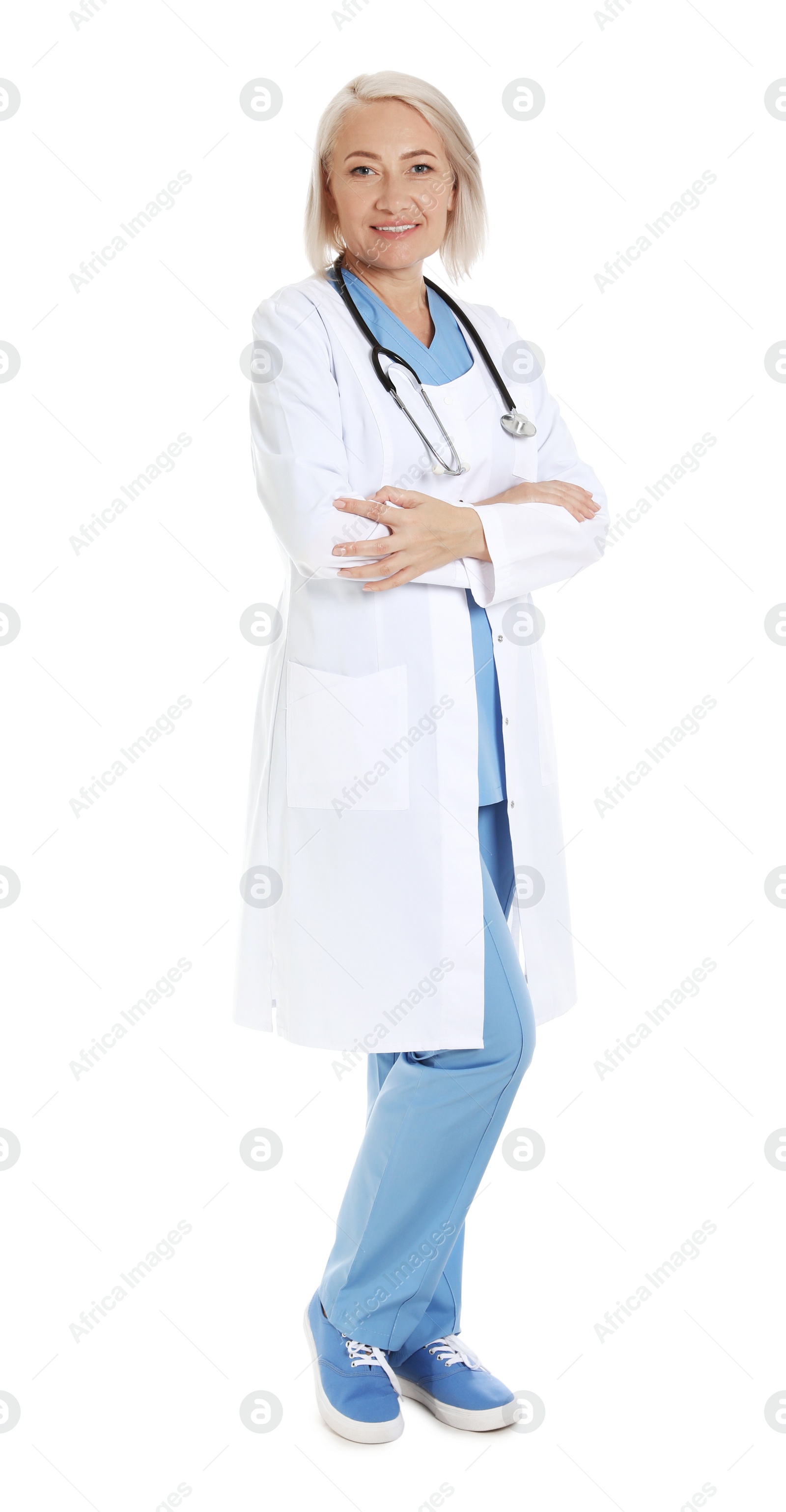 Photo of Full length portrait of female doctor isolated on white. Medical staff