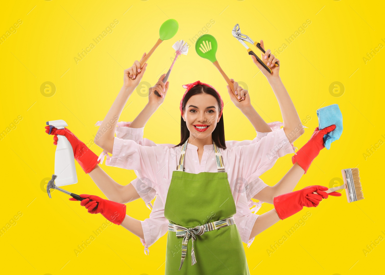 Image of Multitask housewife with many hands holding different stuff on yellow background
