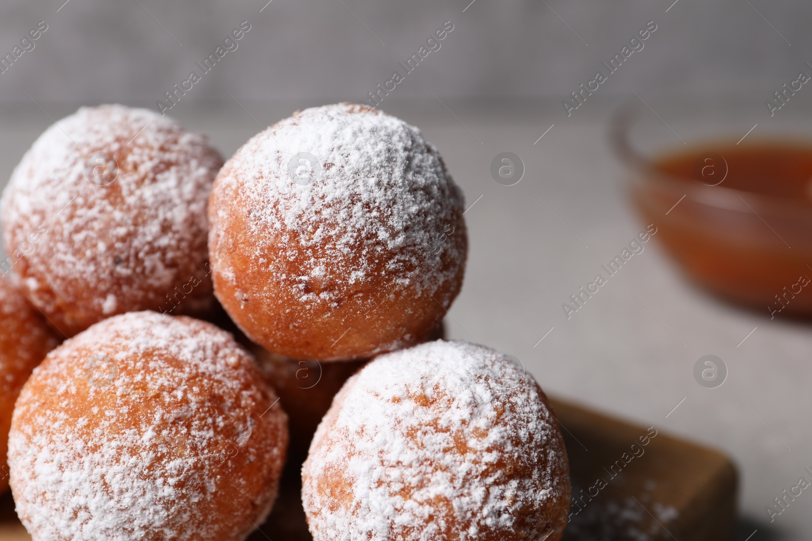 Photo of Delicious sweet buns on table, closeup. Space for text