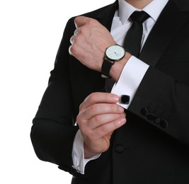 Photo of Man wearing stylish suit and cufflinks on white background, closeup