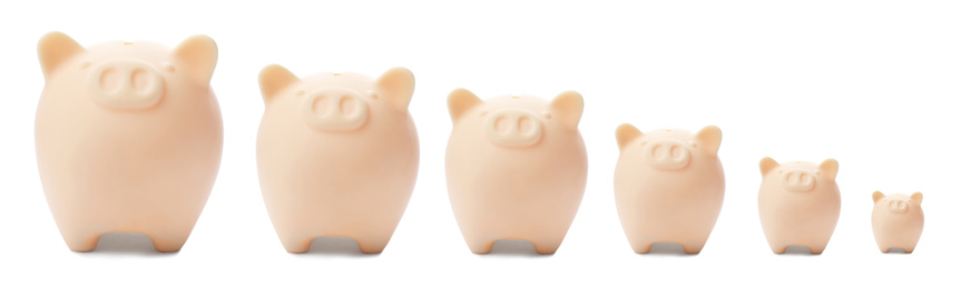 Image of Set with ceramic piggy banks on white background. Banner design