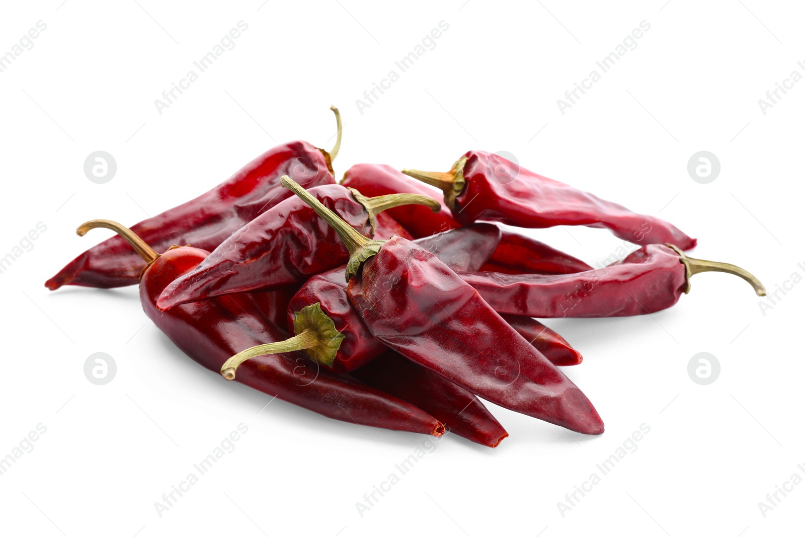 Photo of Dry chili peppers on white background