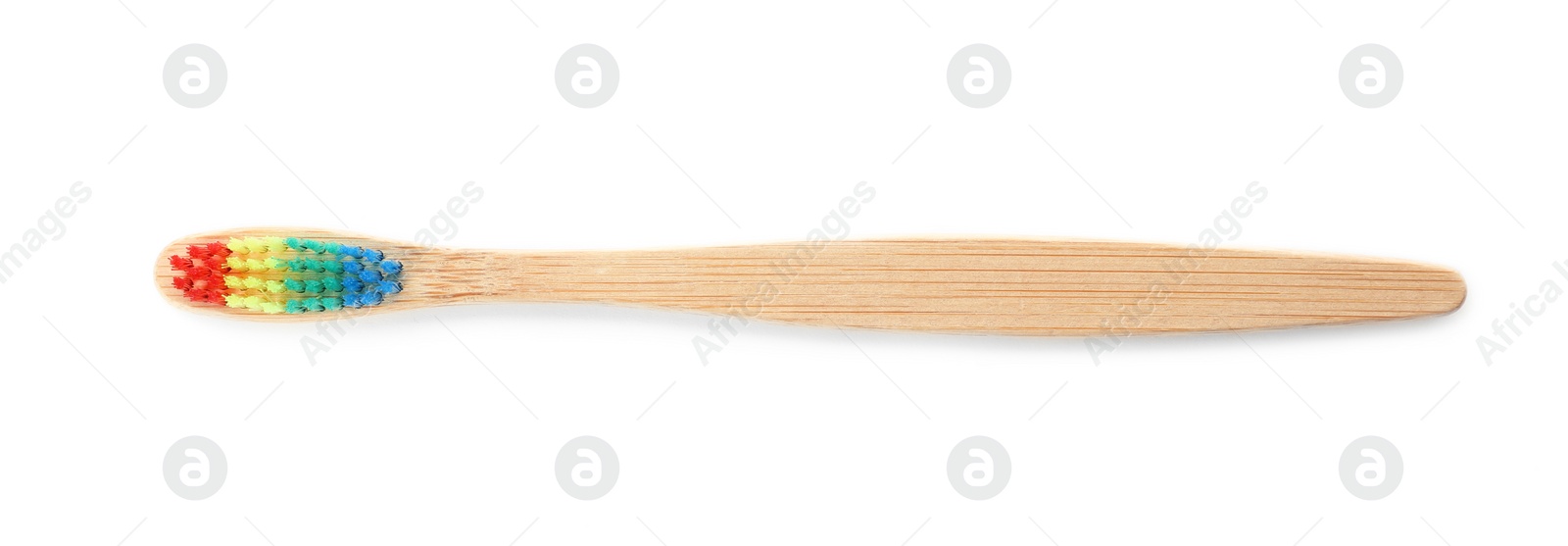 Photo of Toothbrush made of bamboo on white background, top view