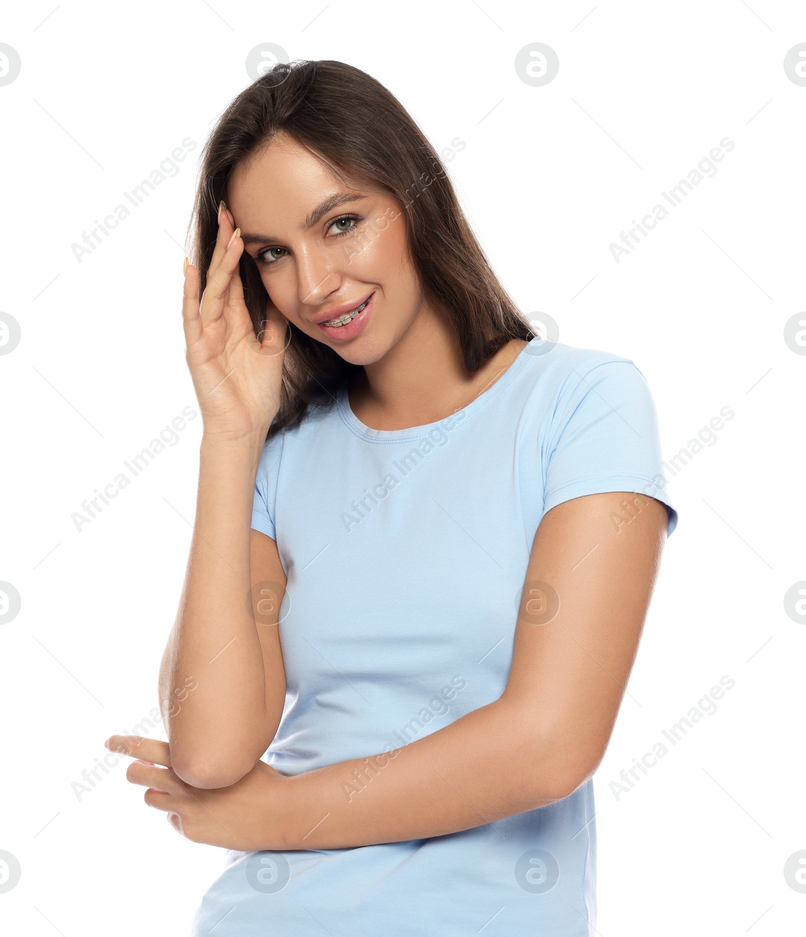 Photo of Embarrassed woman covering face with hand on white background