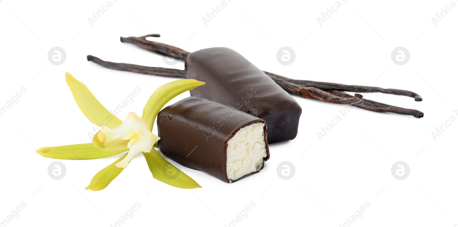 Photo of Glazed curd cheese bars, vanilla pods and flower isolated on white