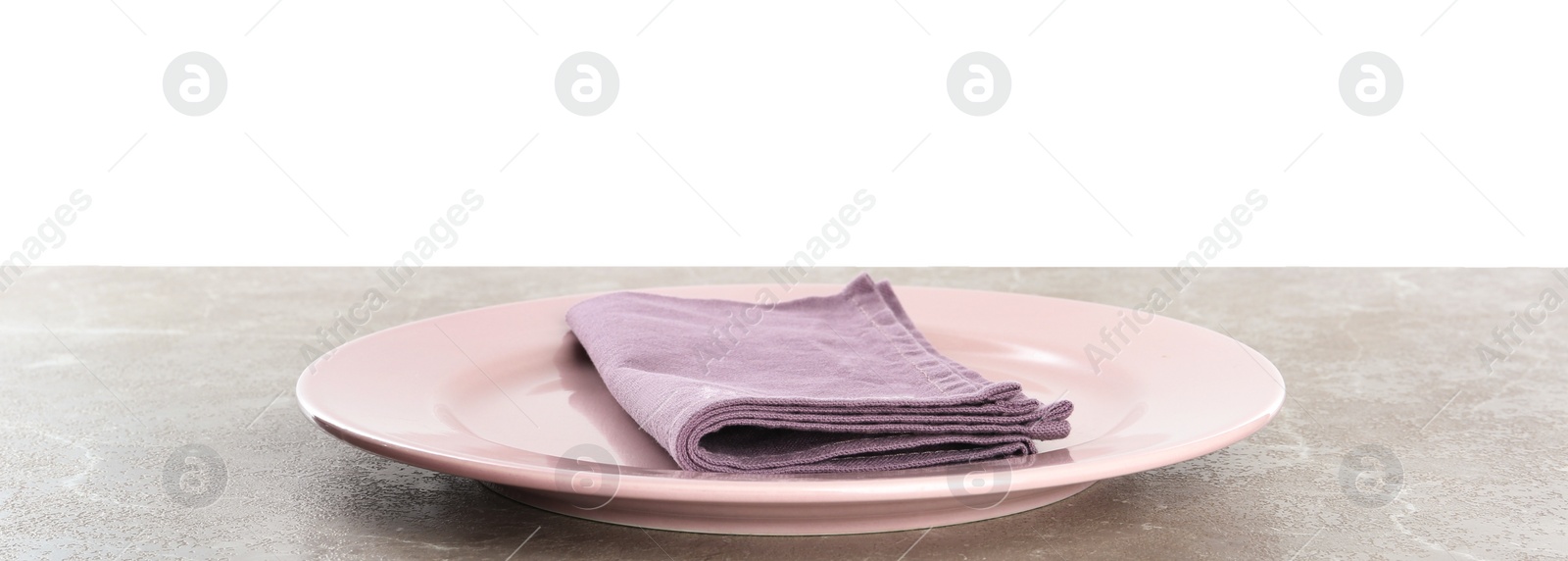 Photo of Empty plate and napkin on marble table