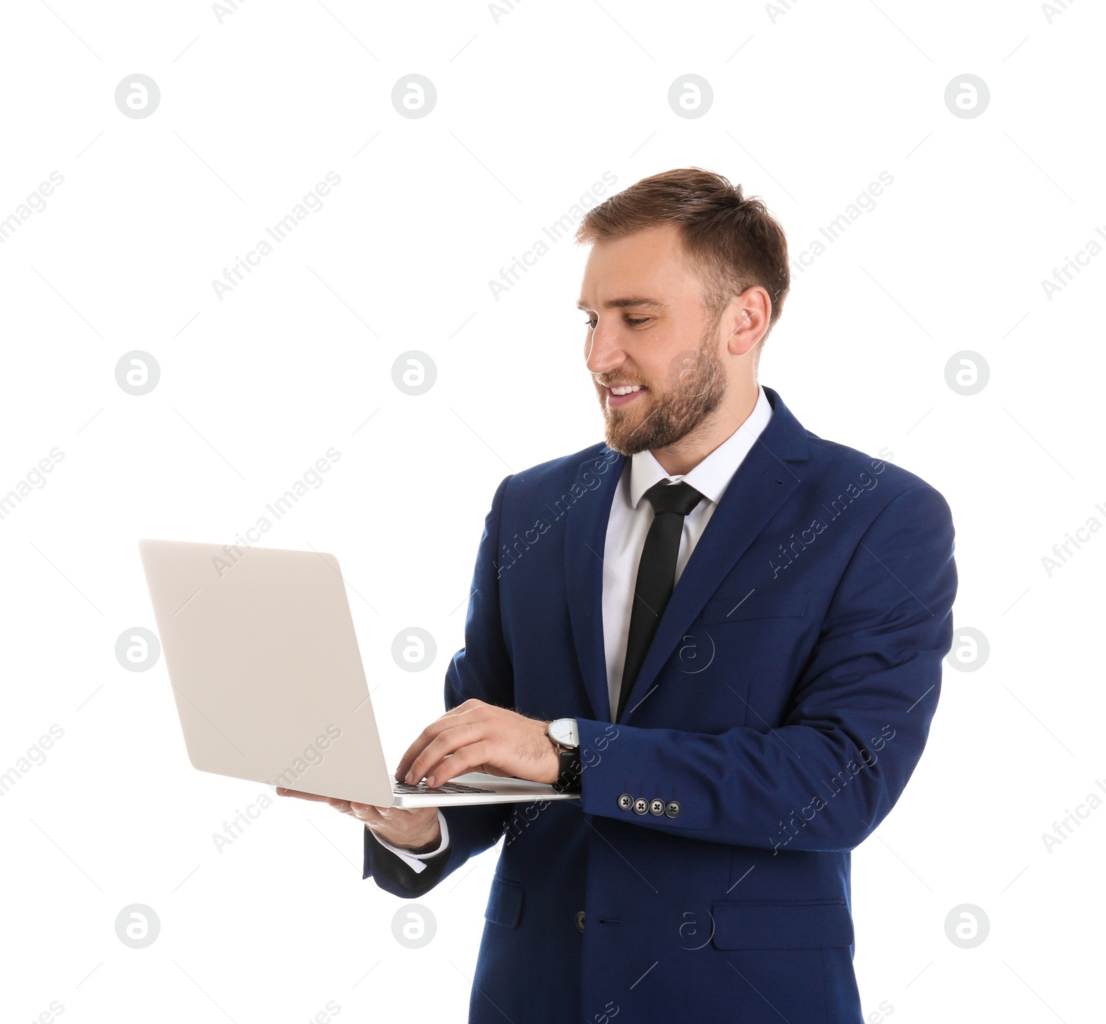 Photo of Happy young businessman using laptop on white background