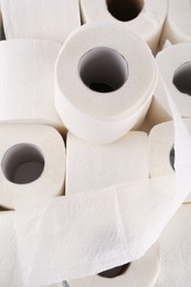 Photo of Many soft toilet paper rolls as background, above view