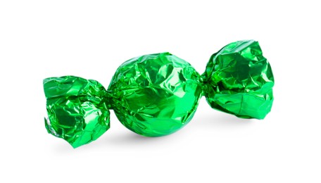 Photo of Tasty candy in green wrapper isolated on white