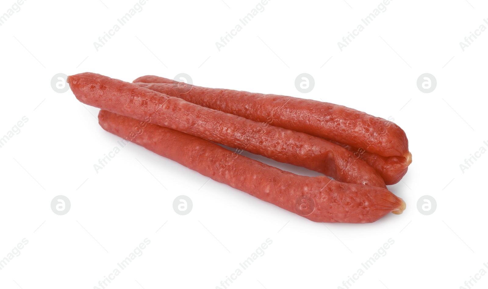 Photo of Thin dry smoked sausages isolated on white